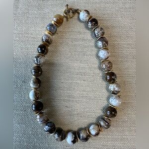 Brioche agate & hammered brass discs & toggle clasp. 17 1/2 inches long.